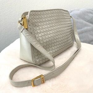 Silver/ Pearl Ganson San Francisco leather bag. Gold accents.